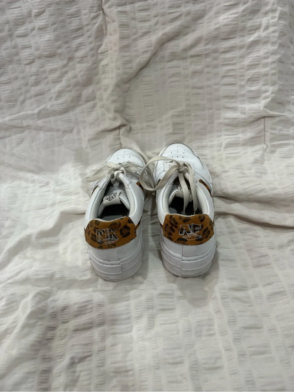 Nike White Sneakers with Leopard Swoosh and Heel